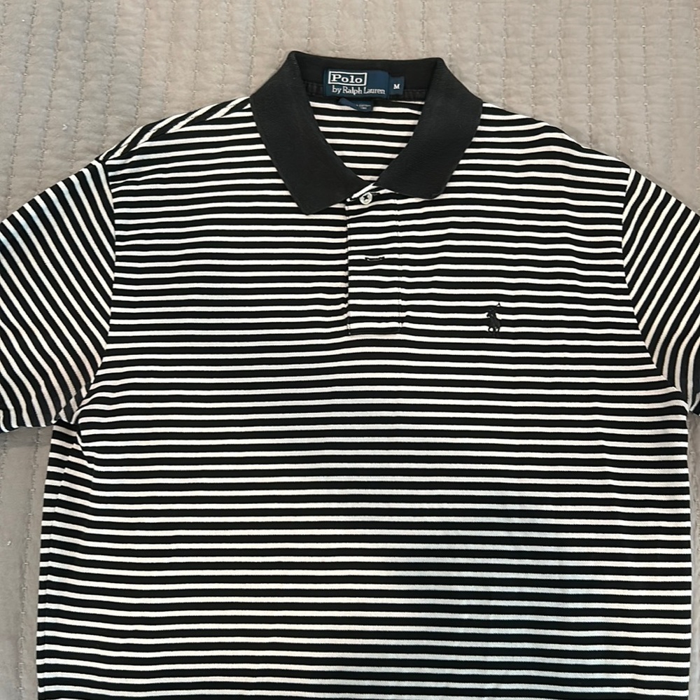 Men’s black and white striped polo